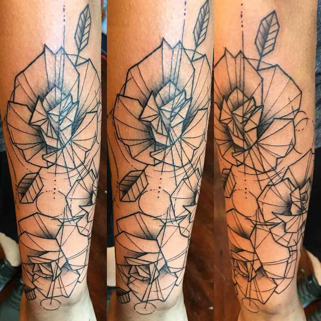 Geometric tattoo design with abstract roses and lines on forearm