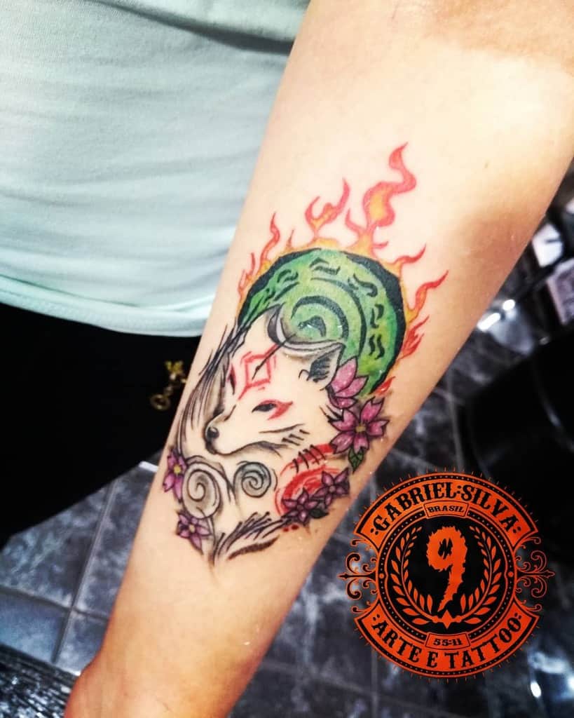 Vibrant forearm tattoo featuring a white Japanese-style wolf with red markings, surrounded by purple flowers and intricate swirls