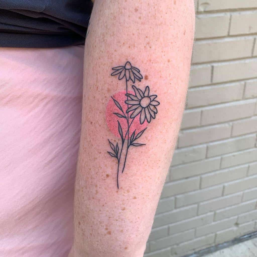 Line tattoo of daisies with a red circle on a person's arm