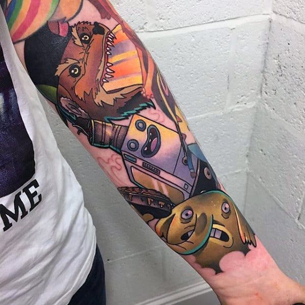 Adventure Time sleeve tattoo featuring BMO, Gunter, and the wolves from the show in a dynamic, colorful forearm design.