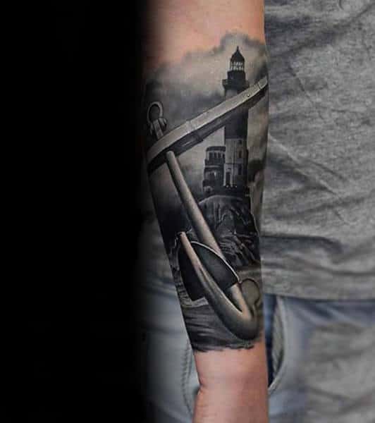 Forearm tattoo of an anchor with a lighthouse in the background
