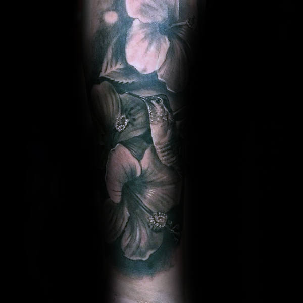 Forearm Sleeve Hummingbird With Floral Design Tattoo On Male