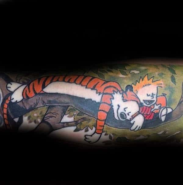 Forearm Sleeve Mens Tattoo Of Calvin And Hobbes Sleeping On Tree Branch
