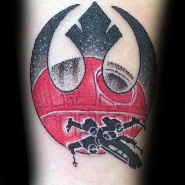 Black and red Rebel Alliance tattoo on forearm featuring a Death Star and X-Wing fighter design.