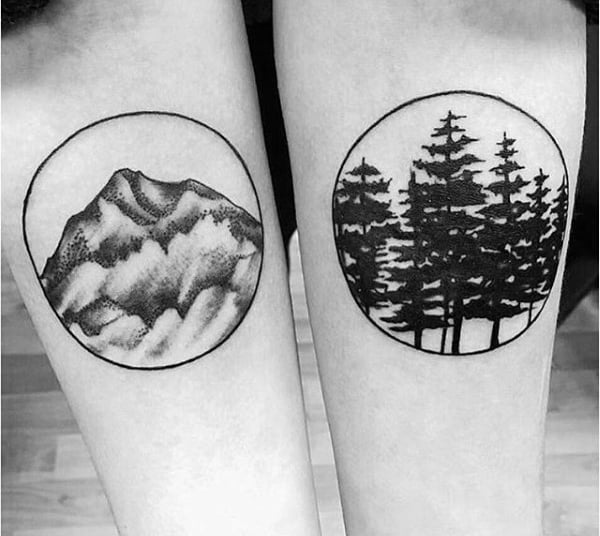 Forest And Mountain Circle Tattoos On Mans Inner Arms