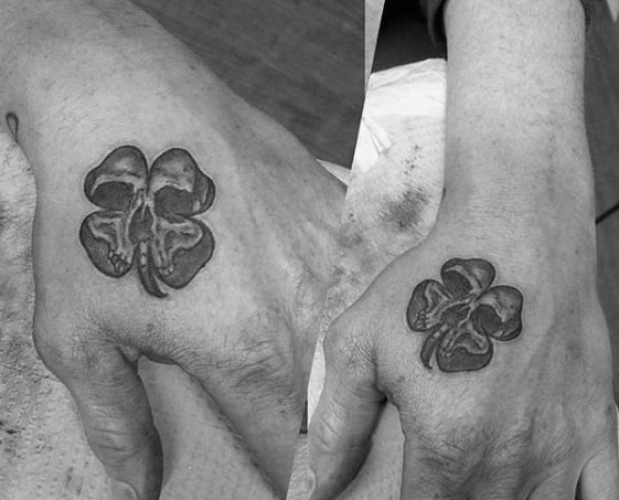 Four Leaf Clover Skull Male Small Hand Tattoo
