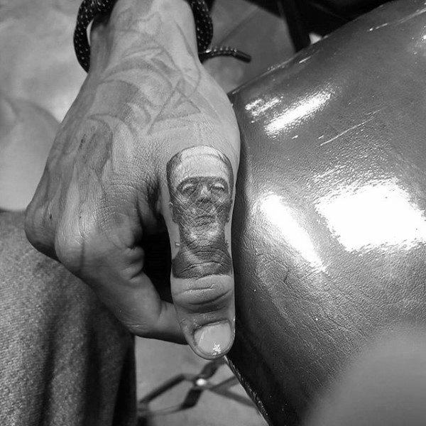 Frankenstien Thumb Tattoos For Men