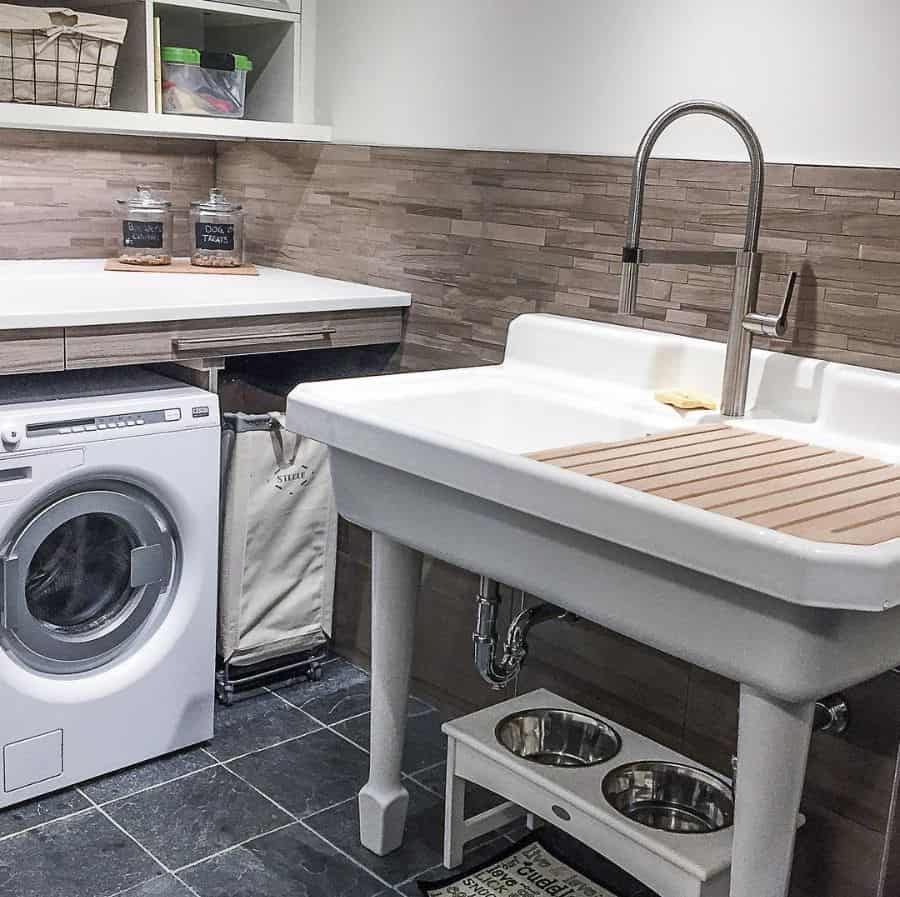 large white free standing laundry room sink and washer
