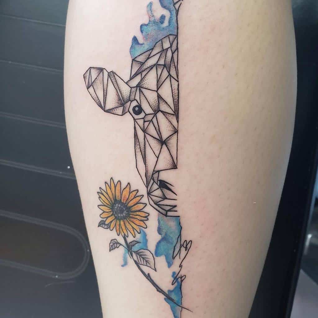 Geometric sister tattoo with blue watercolor splashes and a yellow sunflower with leaves