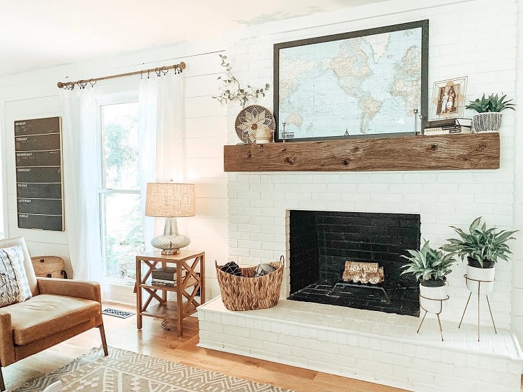 fresh white brick fireplace wood beam mantel