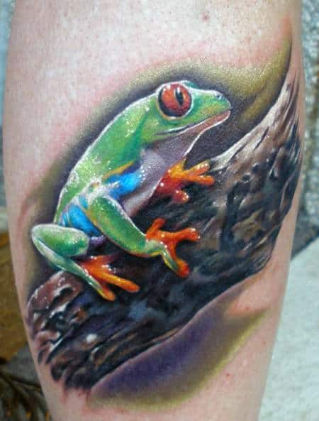 Frog On Wood Branch Mens Leg Tattoos