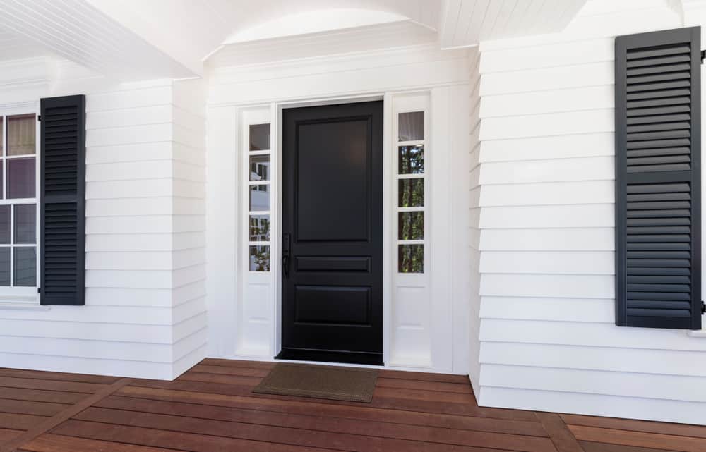 black front door white farmhouse 