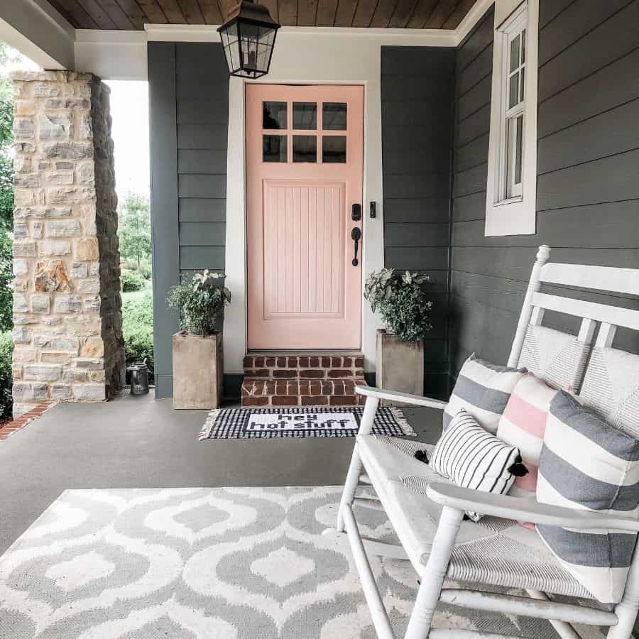 pink front door gray home patio