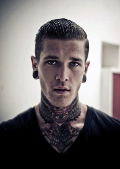 fFont neck tattoo featuring geometric patterns and an all-seeing eye design.