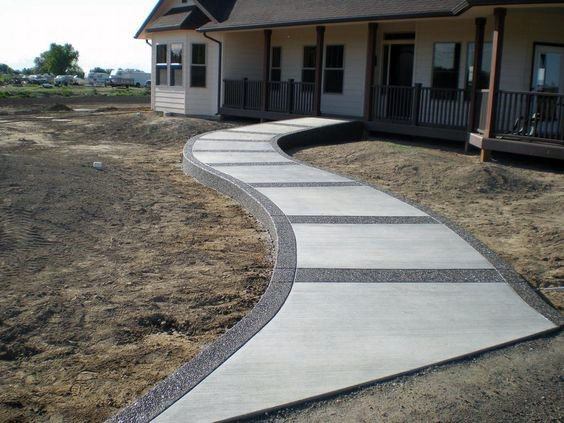 concrete walkway with gravel accent texture
