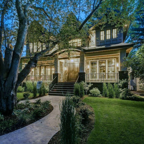 tree-lined front yard walk path