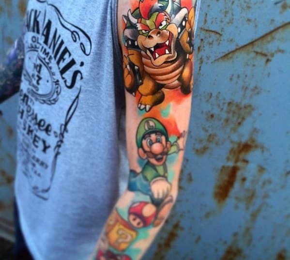 Colorful Bowser and Luigi tattoo sleeve featuring dynamic shading, bold outlines, and classic Super Mario elements for a vibrant gaming design.
