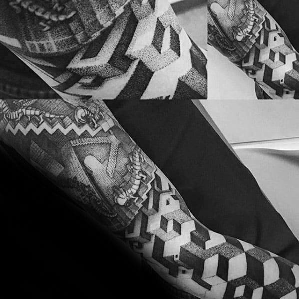 MC Escher-inspired sleeve tattoo featuring interlocking 3D cubes and a detailed staircase illusion with surreal architectural elements.