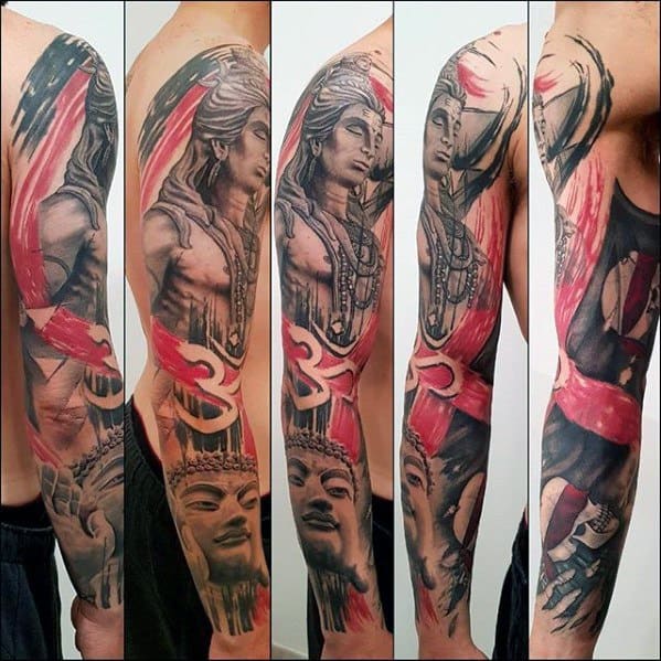 Full-sleeve tattoo of Lord Shiva featuring dynamic red brush strokes, Om symbol, and realistic shading, blending tradition with modern artistry.