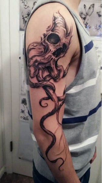Full Arm Squid And Skull Male Tattoo