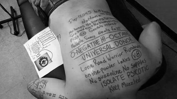 Full Back Guy With Mad Max Tattoo Design