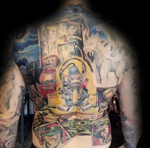 Epic full-back Call of Duty Zombies tattoo featuring the Monkey Bomb, Perk-a-Cola machines, and undead creatures in a vivid, detailed design.