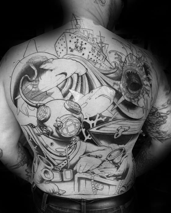 Back tattoo of diver, battleship, wave, and shark in black and white