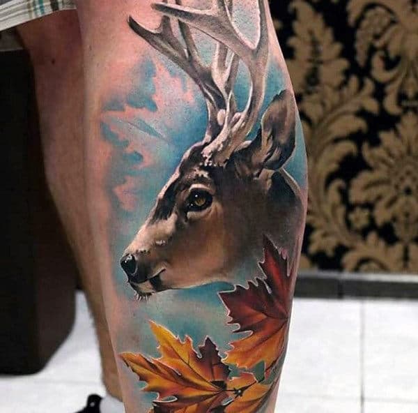 Full Color Mens Leg Calf Deer Tattoo With Blue Sky And Orange Leaves