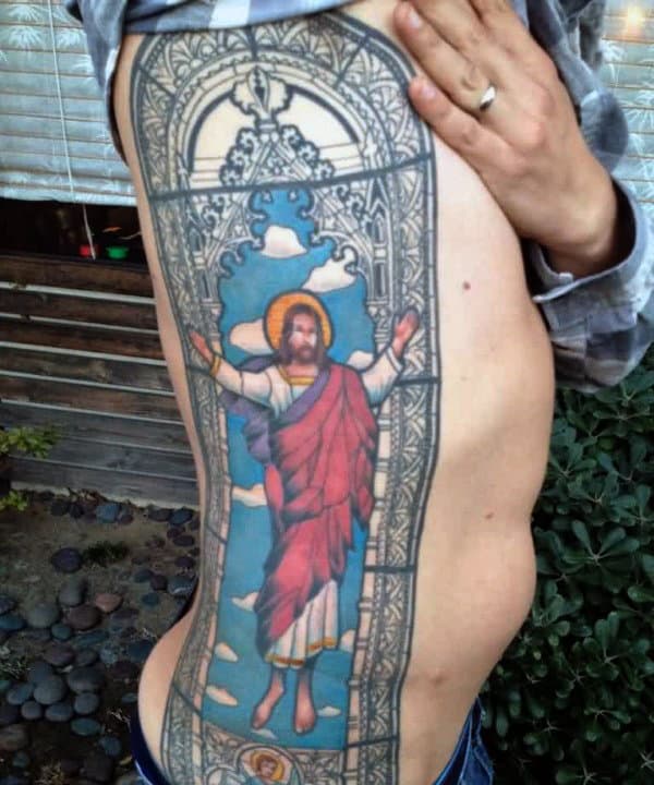 Full Rib Cage Side Stained Glass Tattoo On Male Of Jesus