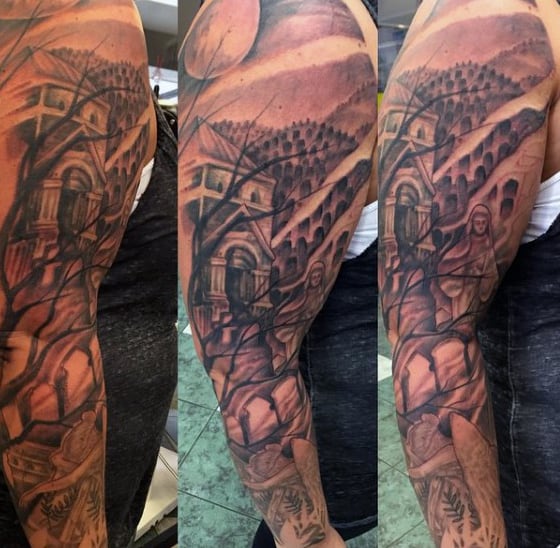 Forearm tattoo of a medieval scene with a castle, knight, intricate architectural details, and an ancient graveyard in the background
