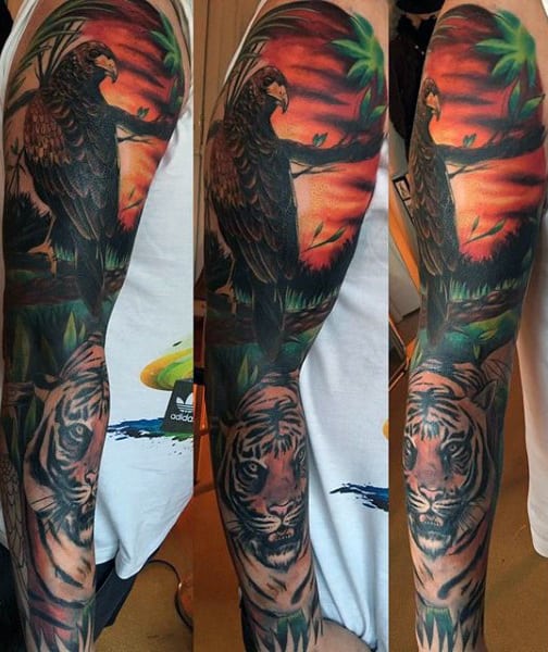 Full Sleeve Hawk Watches Crouching Tiger At Sunset Tattoo On Gentleman