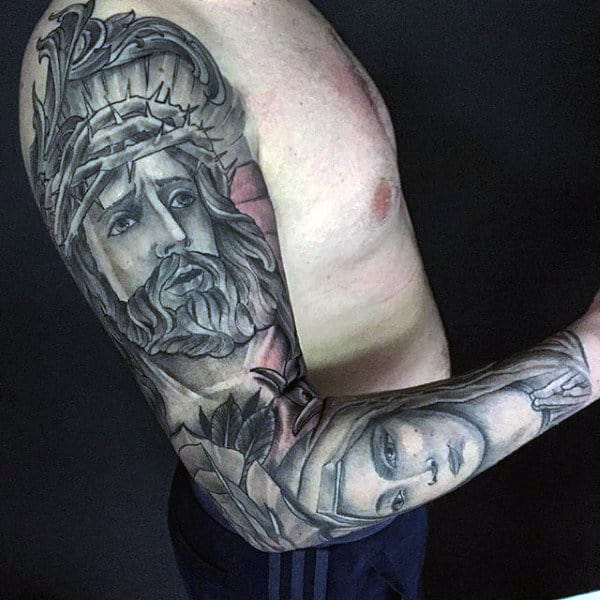 Full Sleeve Tattoo Of Jesus Christ On Male