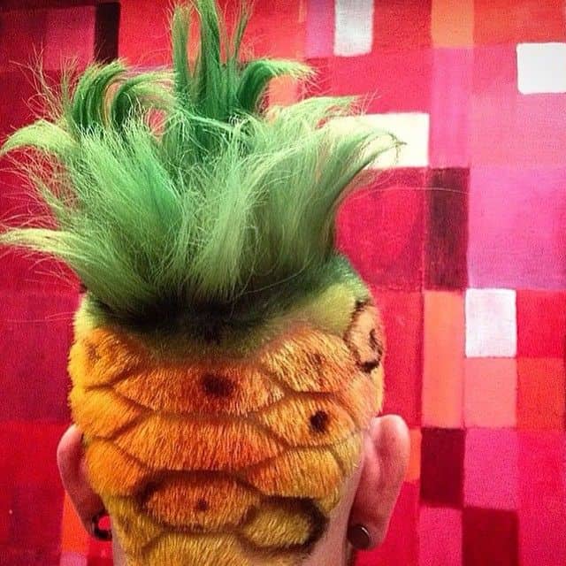 A Mohawk haircut created in shape of a pineapple for maximum cyberpunk look