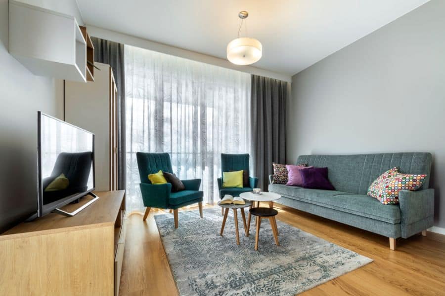 blue sofa in small apartment living room