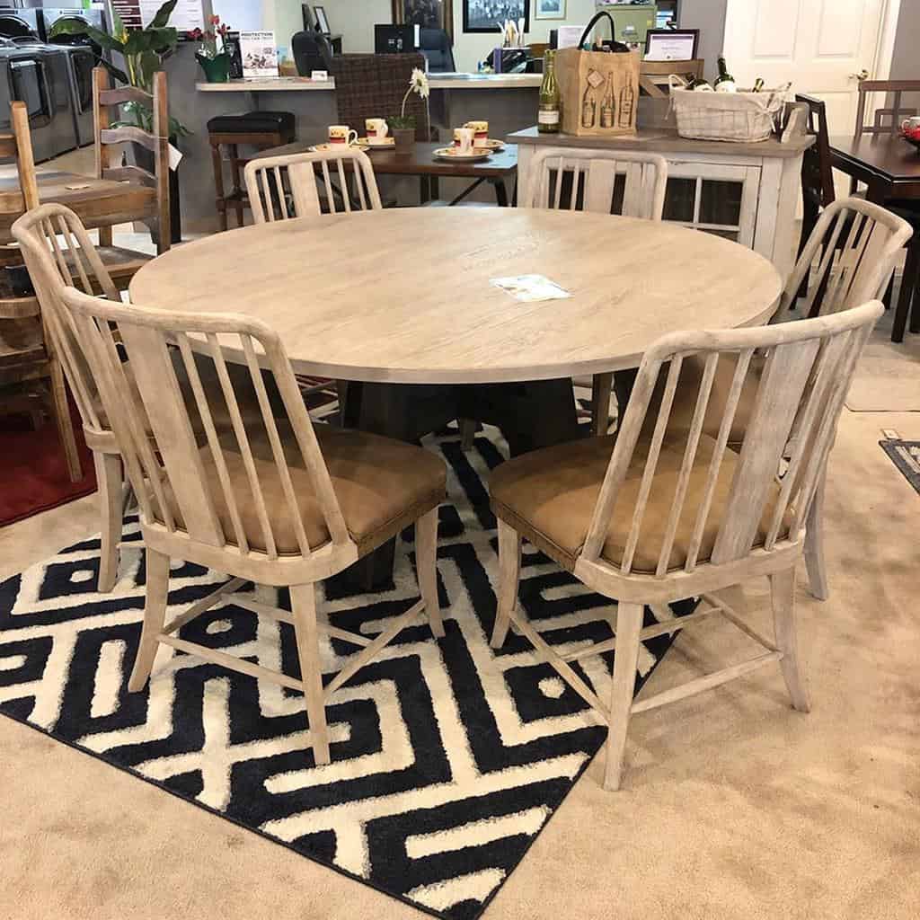 wood table in large open kitchen dining room layout