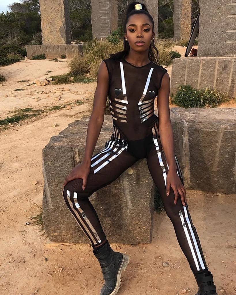 futuristic fashion black mesh overalls with metallic stripes