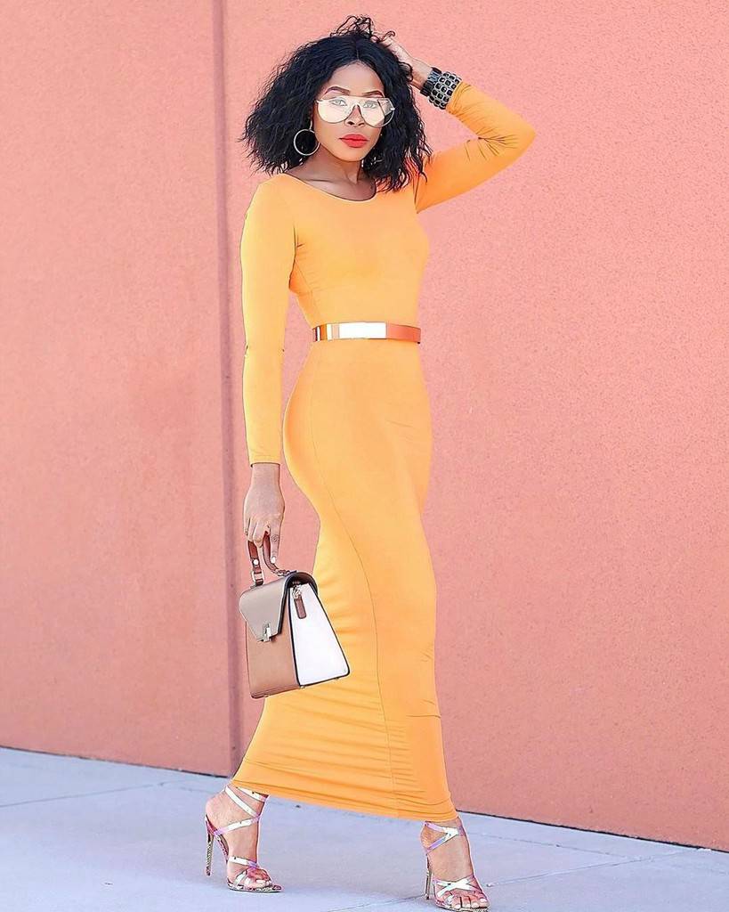 futuristic fashion with bright orange body con dress