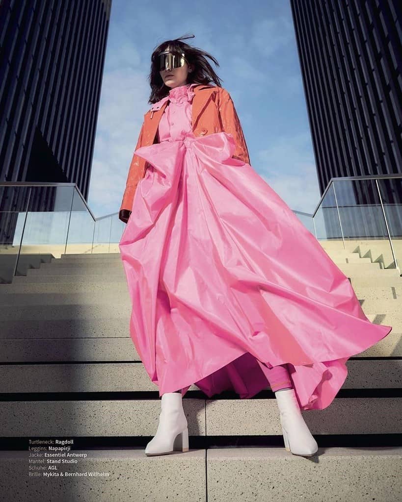 futuristic fashion with orange jacket and pink big dress
