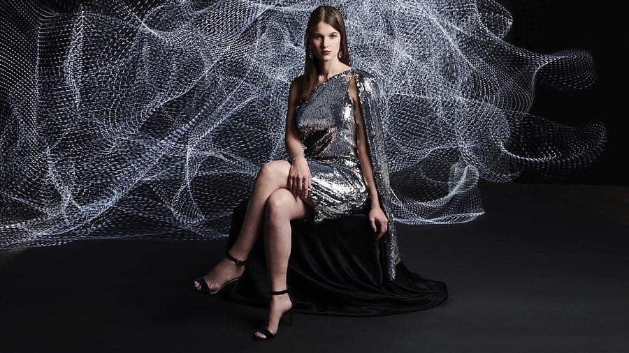 futuristic fashion with short mettalic fabric dress