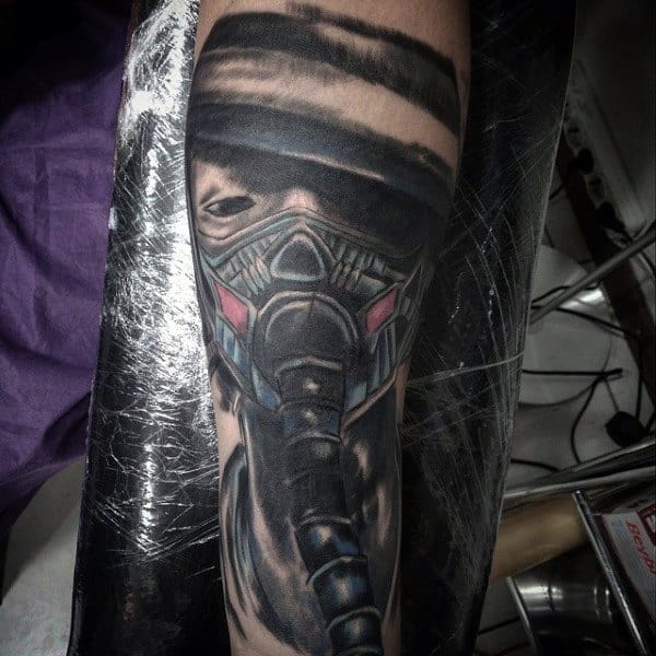 Futuristic Themed Gas Mask Tattoo Design For Men On Forearm