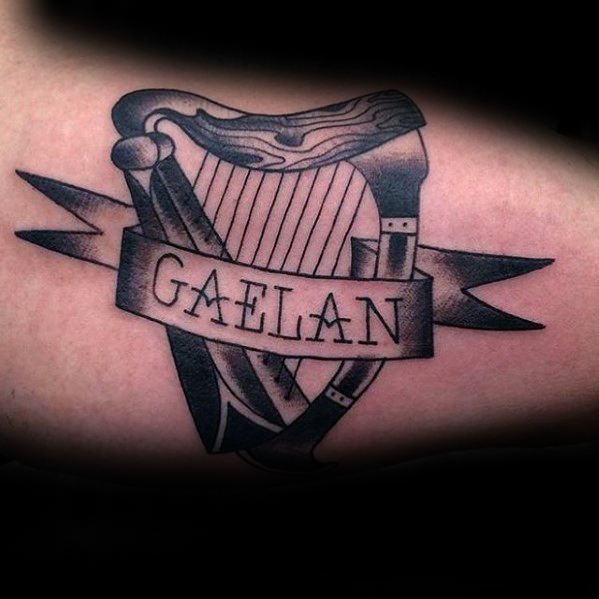Gaelan Banner Inner Arm Bicep Harp Male Tattoo Ideas