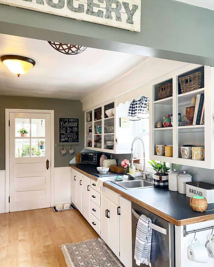 white country style kitchen black countertop 