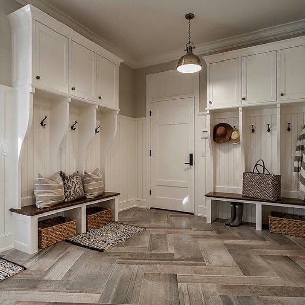 white cabinet mudroom with vinyl flooring