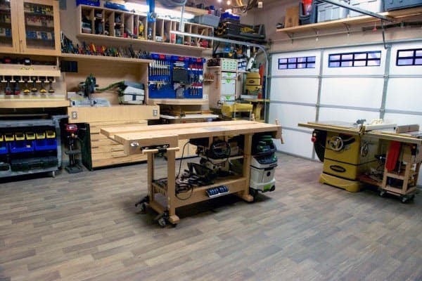 tile floor garage wood bench saw organized tools