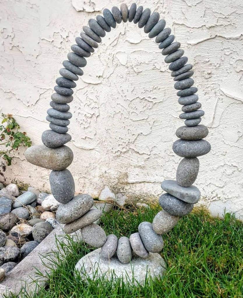 stone garden art textured white wall backyard