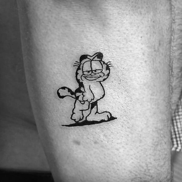 Minimalist black and gray Garfield tattoo with a smug expression and confident stance—perfect for a bold yet subtle design.