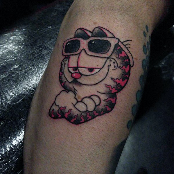 Cool Garfield tattoo with sunglasses and a smug grin, featuring bold black and red shading—perfect for a stylish and confident look.