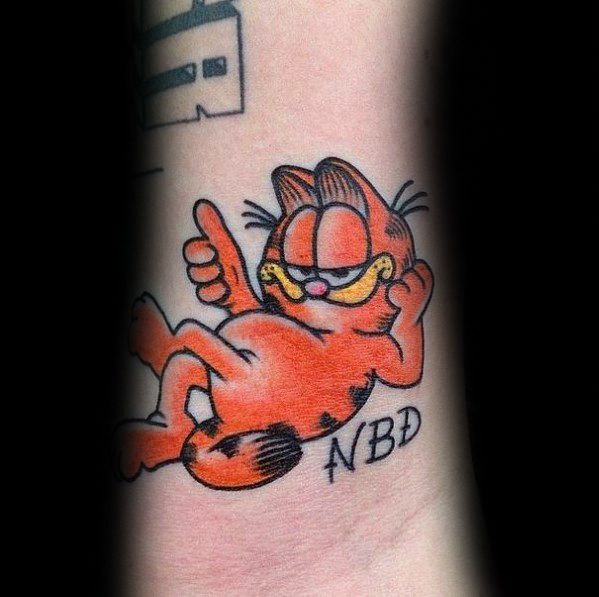 Relaxed Garfield tattoo giving a thumbs-up with 'NBD' text, featuring bold colors and a laid-back vibe—perfect for a carefree design.