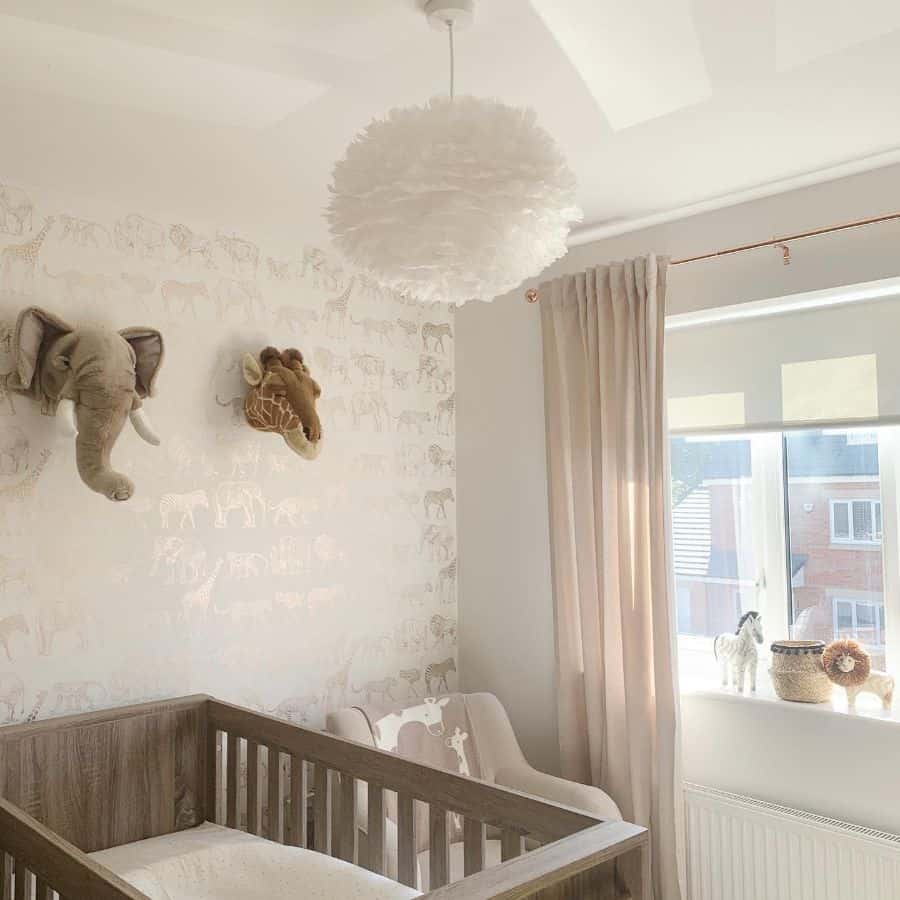 animal wallpaper baby nursery wood crib pink curtains