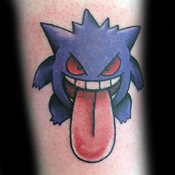 Cheeky Gengar tattoo with exaggerated red eyes and a huge tongue sticking out, done in a bold and playful cartoon style.